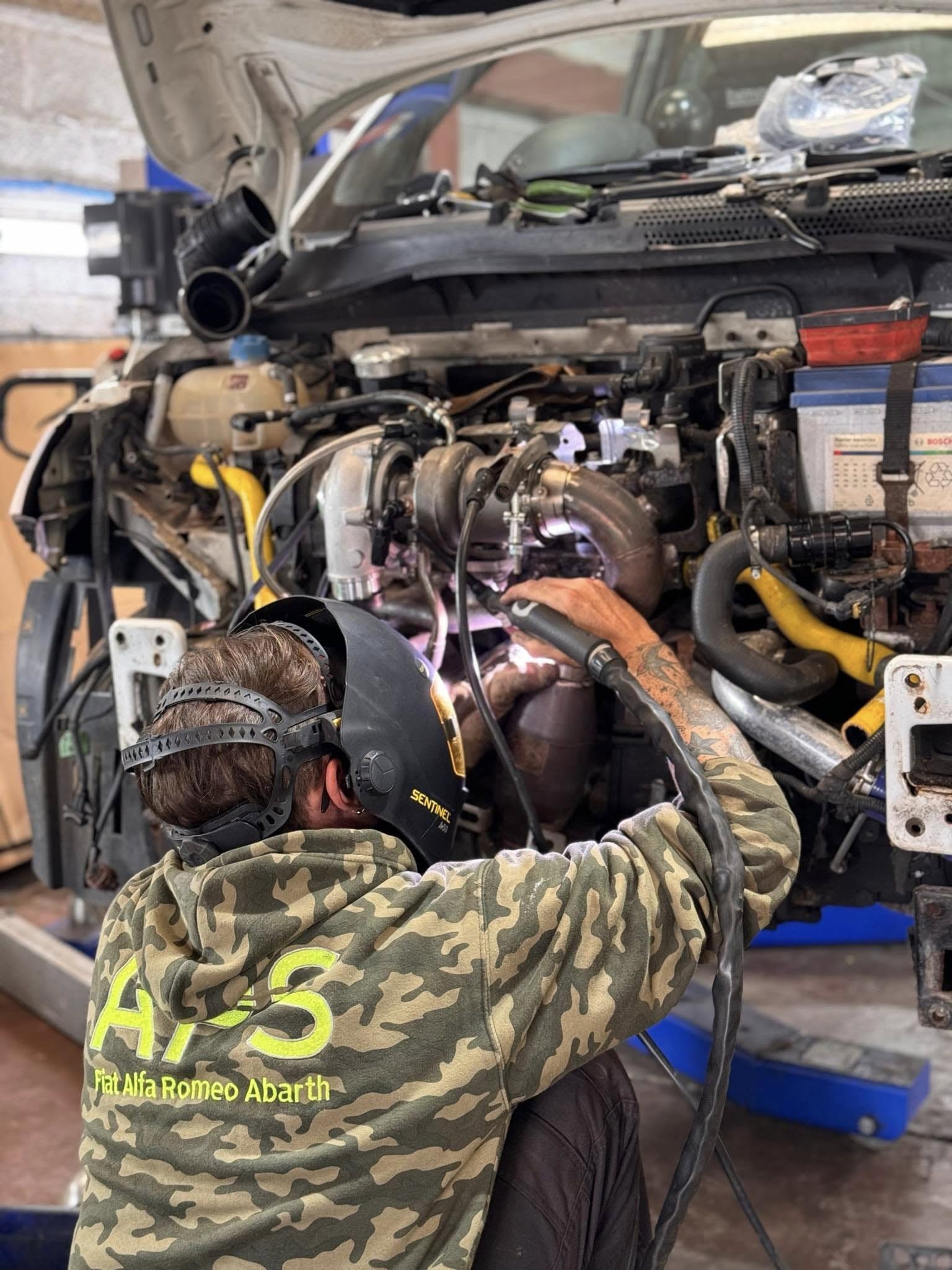 Mechanic working on a car